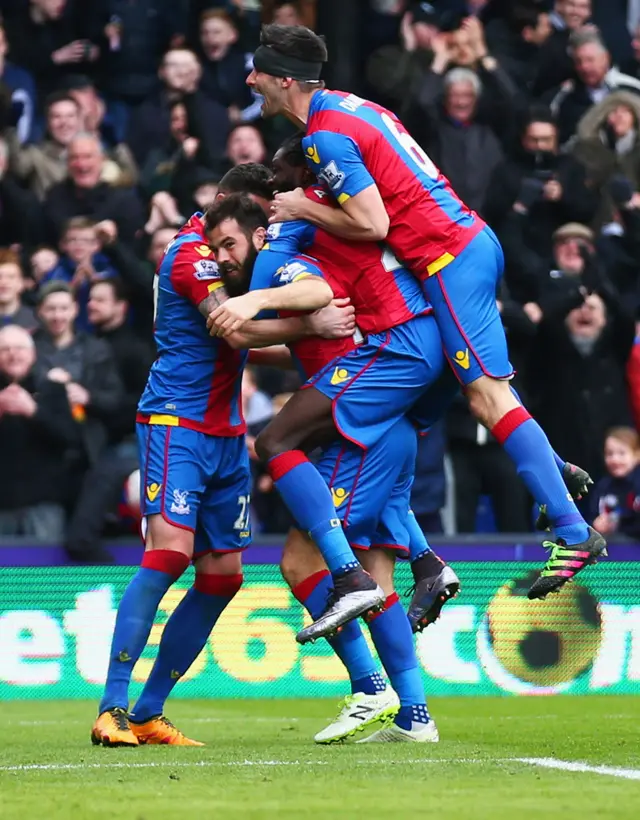 Palace players celebrate the opener