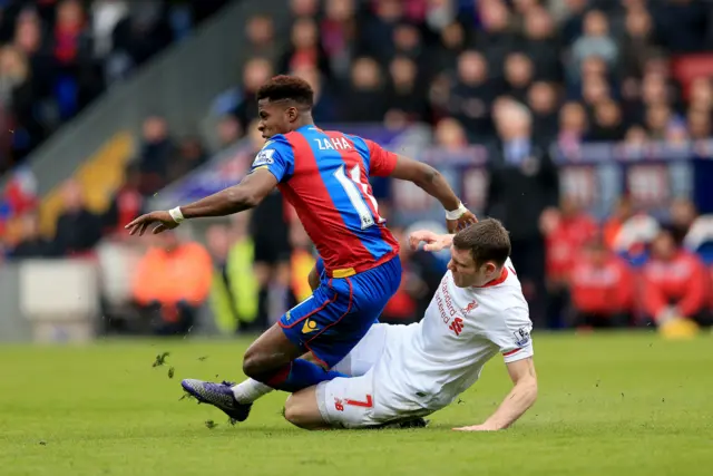 Liverpool's James Milner commits his second bookable offence