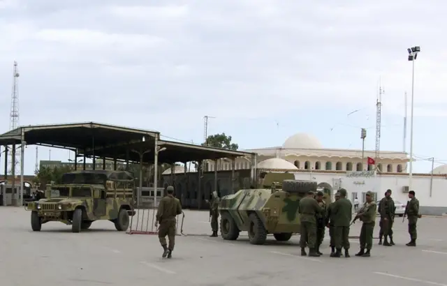 File photo of Tunisian soldiers standing guard at the border crossing at Ras Jdir Ben Guerdane, in this picture taken December 5, 2014