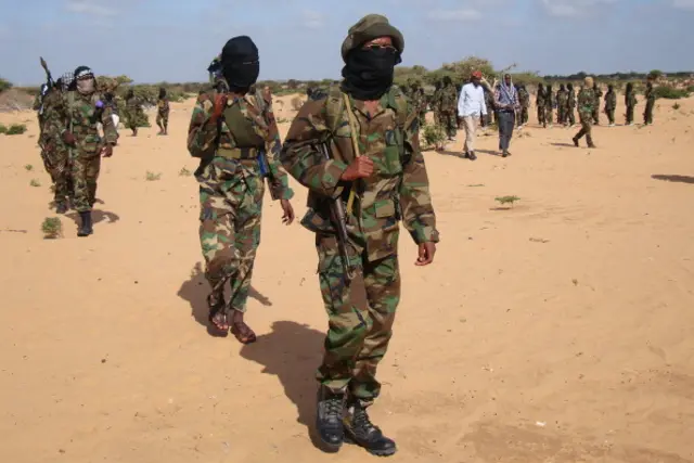 Somali al-Shebab fighters gather on February 13, 2012 in Elasha Biyaha