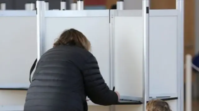 A woman voting