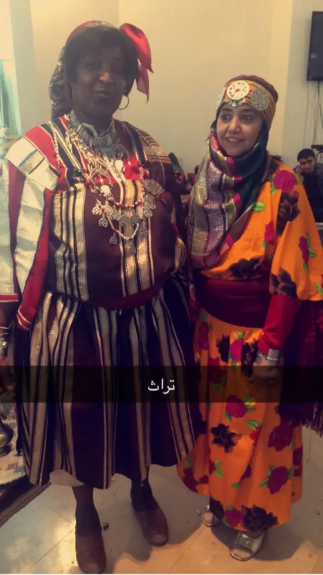 women dressed in wonderful outfits at the festival