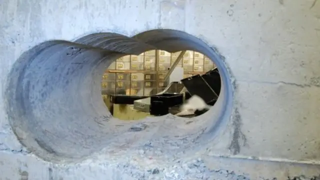 The gang drilled a hole in the wall of the vault