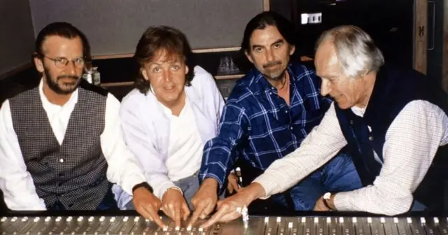 Ringo Starr, George Harrison and Paul McCartney with George Martin