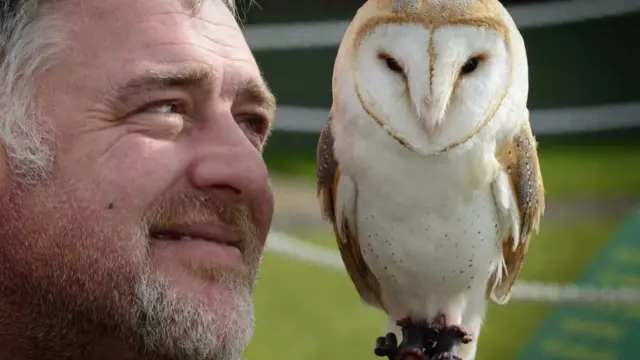 Andrew Campbell, from the Owl Experience Rescue Centre, with a different owl