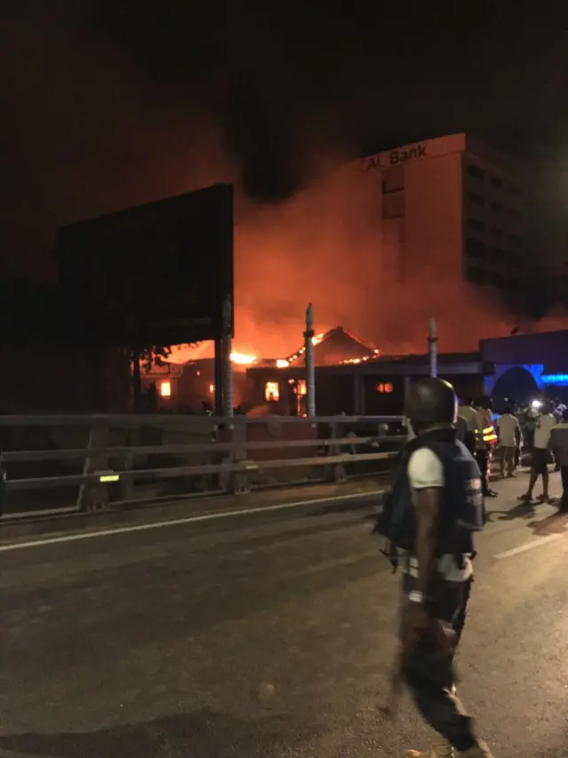 View of the burning Vienna City building, Accra, Ghana