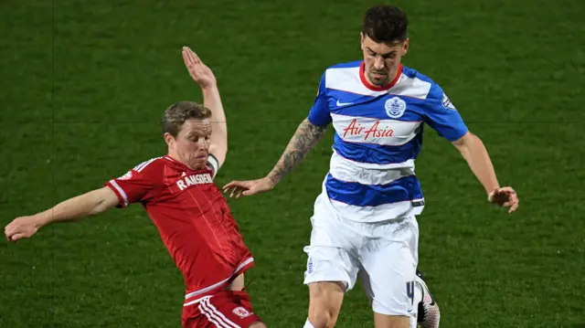 Grant Hall of QPR battles with Grant Leadbitter of Middlesbrough