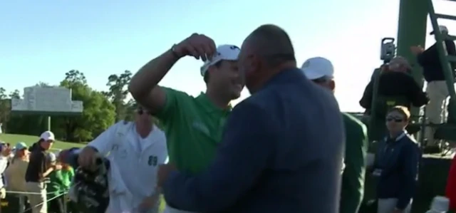 Willett and Chubby Chandler hug