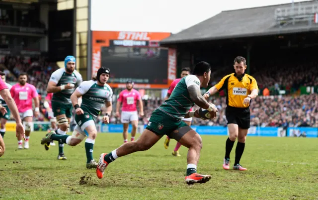 Manu Tuilagi runs in the first try of the match