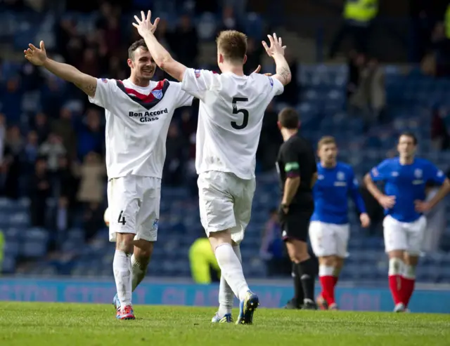 Peterhead celebrate a famous win at Ibrox