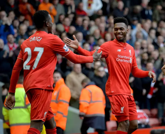 Divock Origi celebrates with Daniel Sturridge