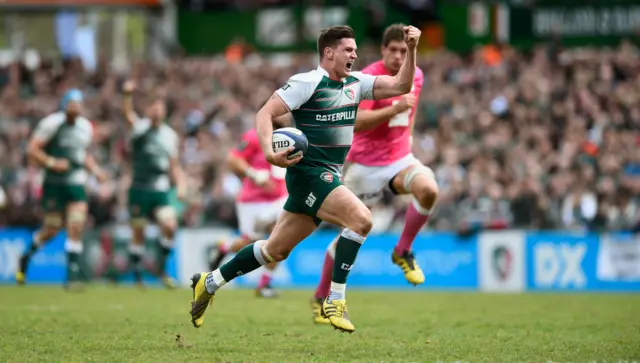 Freddie Burns celebrates scoring a try