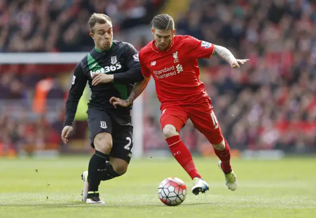 Alberto Moreno challenges Xherdan Shaqiri