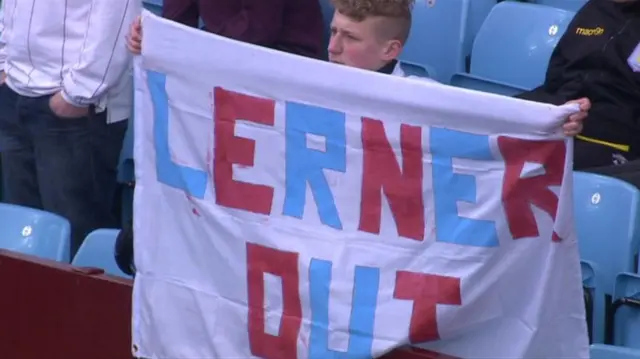 'Lerner out' poster held by Villa fan