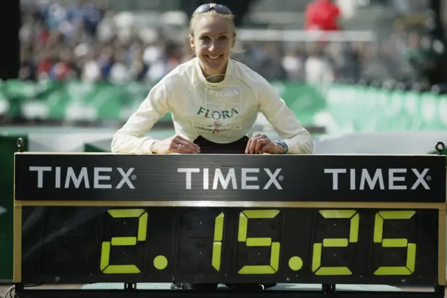 Paula Radcliffe of Great Britain with the womens elite trophy after the 2003 London Marathon