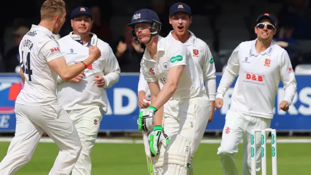 Jamie Porter celebrates wicket