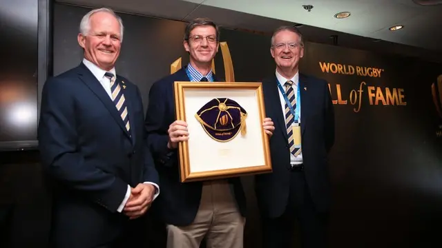 Philip Mobbs (centre) receives Edgar Mobbs' Hall of Fame cap from Bernard Lapasset (r) and Malcolm Hawker (l)