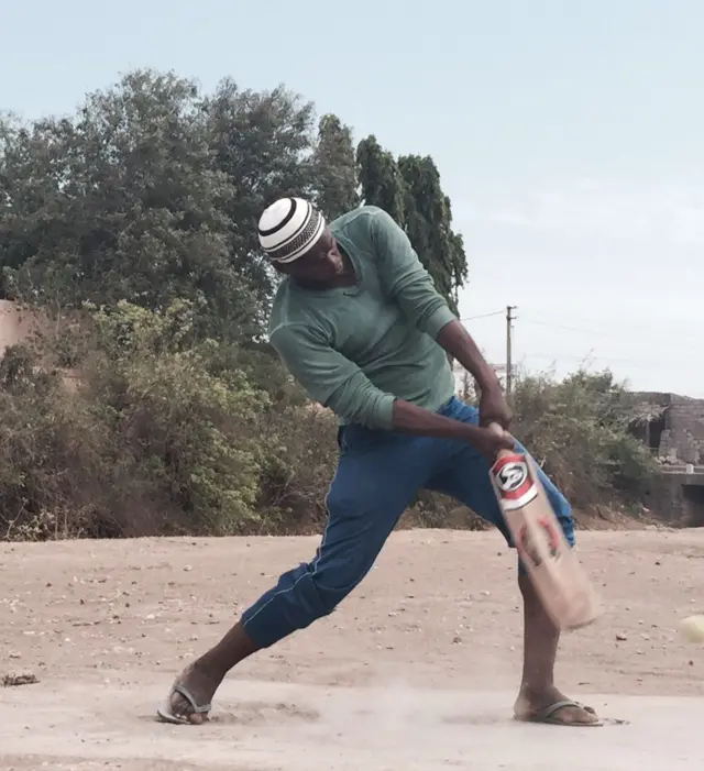 Member of African Siddi community in Gujarat playing cricket