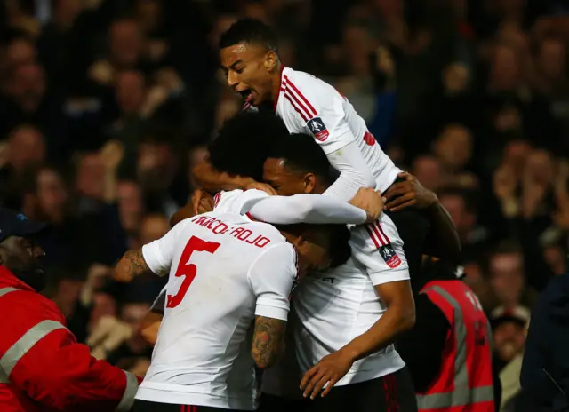 Manchester United's players celebrate