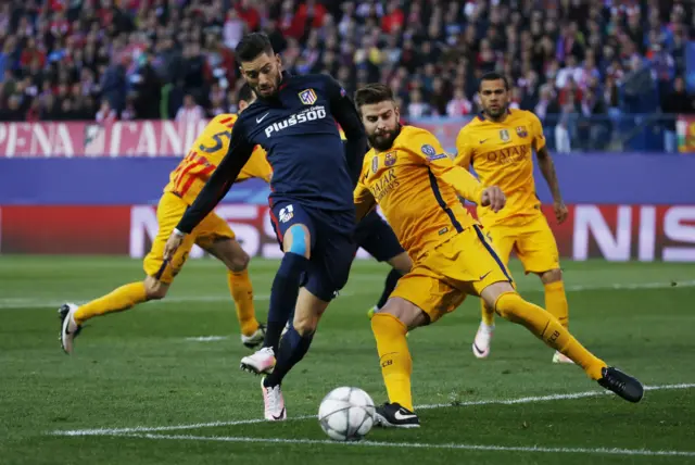 Yannick Carrasco and Gerard Pique