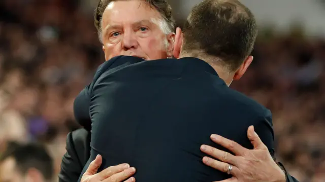 Louis van Gaal and Slaven Bilic embrace