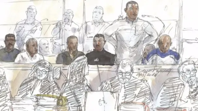 A court sketch from 29 March 2016 shows seven suspected Somali pirates attending their trial in the courthouse in Paris, France