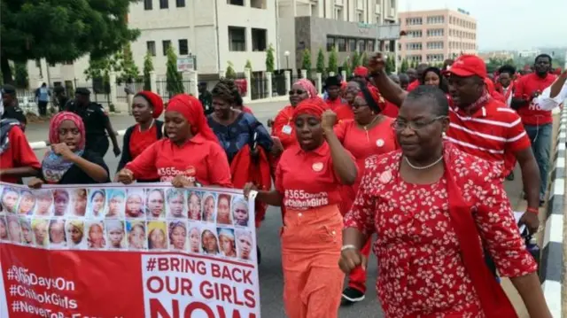 Bring Back Our Girls campaigners walk through the capital Abuja