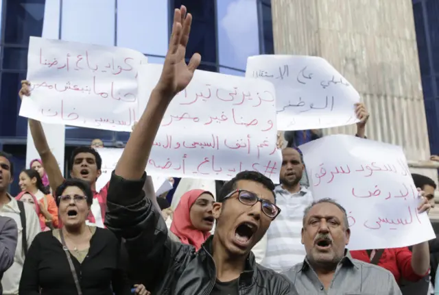 Activists shout slogans against Egyptian President Abdel-Fattah el-Sissi during a protest against the decision to hand over control of two strategic Red Sea islands to Saudi Arabia outside the Press Syndicate building, in Cairo, Egypt, Wednesday, April 13, 2016.