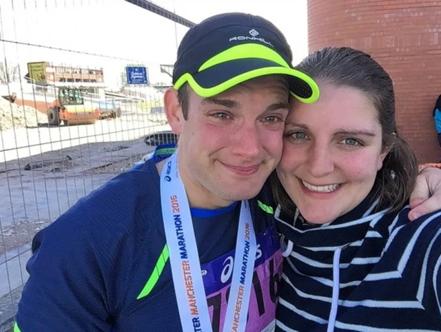 Oliver Appleby has a picture with his proud wife, Charlotte, at the 2016 Manchester marathon