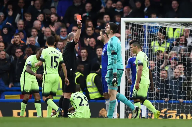 Thibaut Courtois is shown a red card