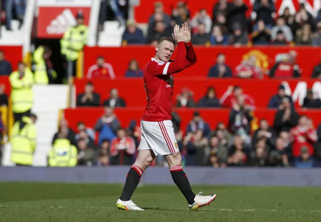 Wayne Rooney applauds