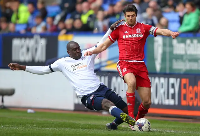 Emile Heskey tackles George Friend