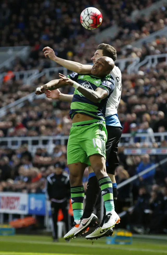 Paul Dummett challenges Andre Ayew