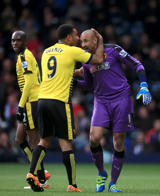 Heurelho Gomes is congratulated by Troy Deeney