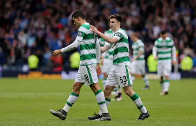 Kieran Tierney consoles Tom Rogic following his crucial penalty miss