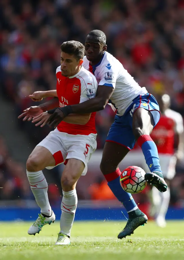 Gabriel of Arsenal and Yannick Bolasie of Crystal Palace