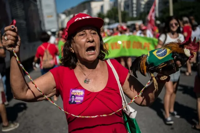 A woman protests in support of Brazilian president Dilma Rousseff