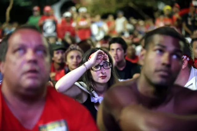 Hundreds of people watch a screen displaying the Chamber of Deputies' discussions in Brasilia, Brazil, 17 April 2016