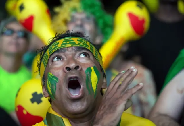 e to the streets as lawmakers vote for pending impeaching proceedings on President Dilma Rousseff 17/04/2016 European Photopress Agency epa05264835 A demonstrator reacts as he, along with hundreds of people, watches a screen displaying the Chamber of Deputies"s discussion, at Paulista Avenue in Sao Paulo, Brazil, 17 April 2016