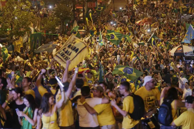 Opponents of President Dilma Rousseff celebrate after the Lower House of Congress voted to proceed with her impeachment in Porto Alegre April 17, 2016.