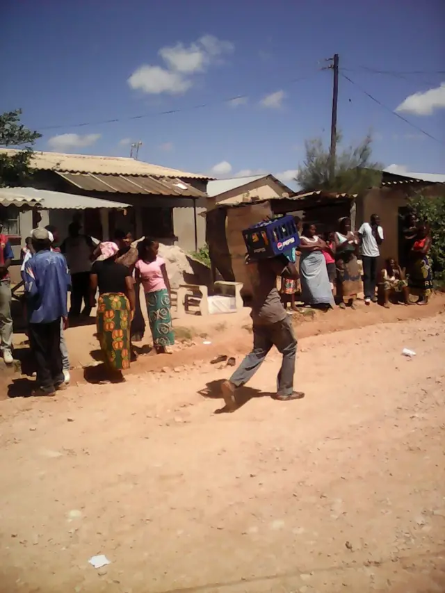 Man carrying away loot