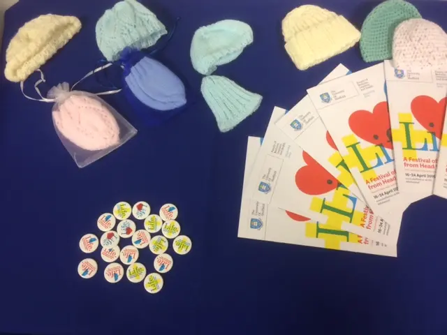 Wool, badges and patterns on table