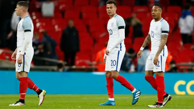 England's players troop off disconsolately after defeat against Netherlands