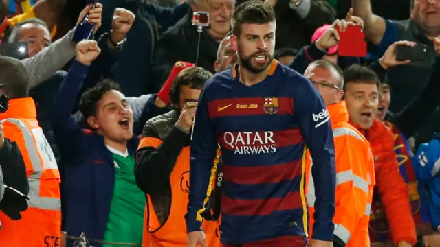 Gerard Pique celebrates