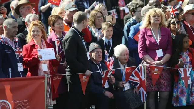 Crowds outside the Royal Mail delivery office