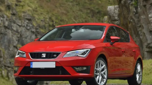 A red Seat Leon Cupra