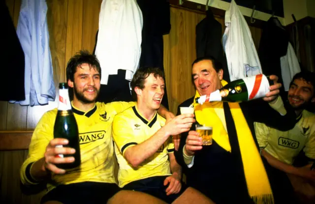 Jeremy Charles and Les Phillips (centre) celebrate with former U's owner Robert Maxwell after their victory in the Milk Cup semi-final against Aston Villa at the Manor Ground