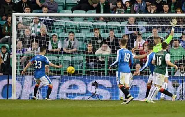 Jason Holt (23) turns in the loose ball after Mark Oxley fumbles the ball onto the bar