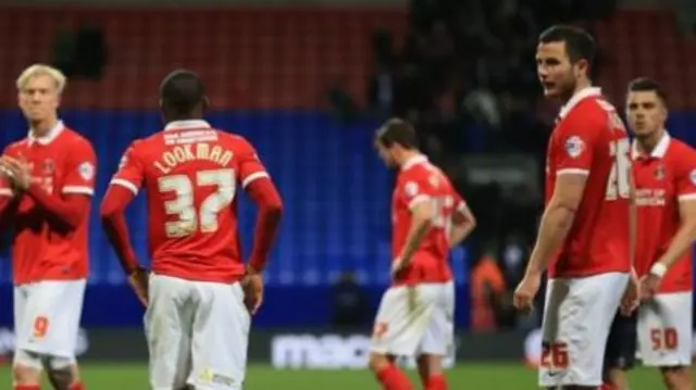 Charlton Athletic players look dejected following relegation