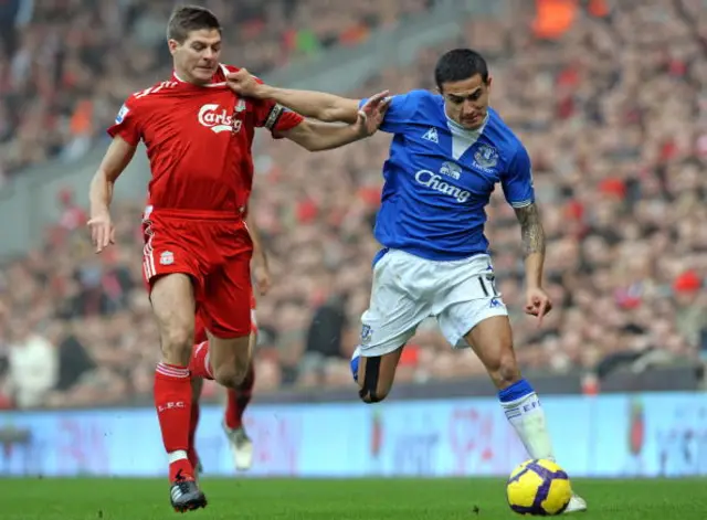 Former Liverpool captain Steven Gerrard (left) and ex-Everton midfielder Tim Cahill